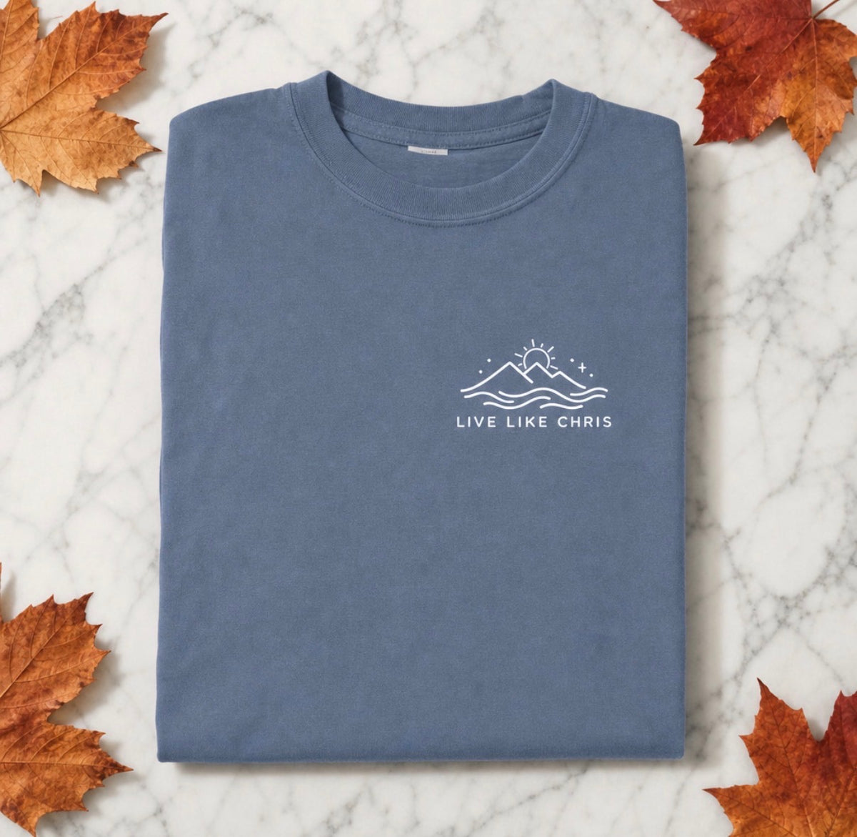 Live Like Chris long sleeve tee in light blue, folded